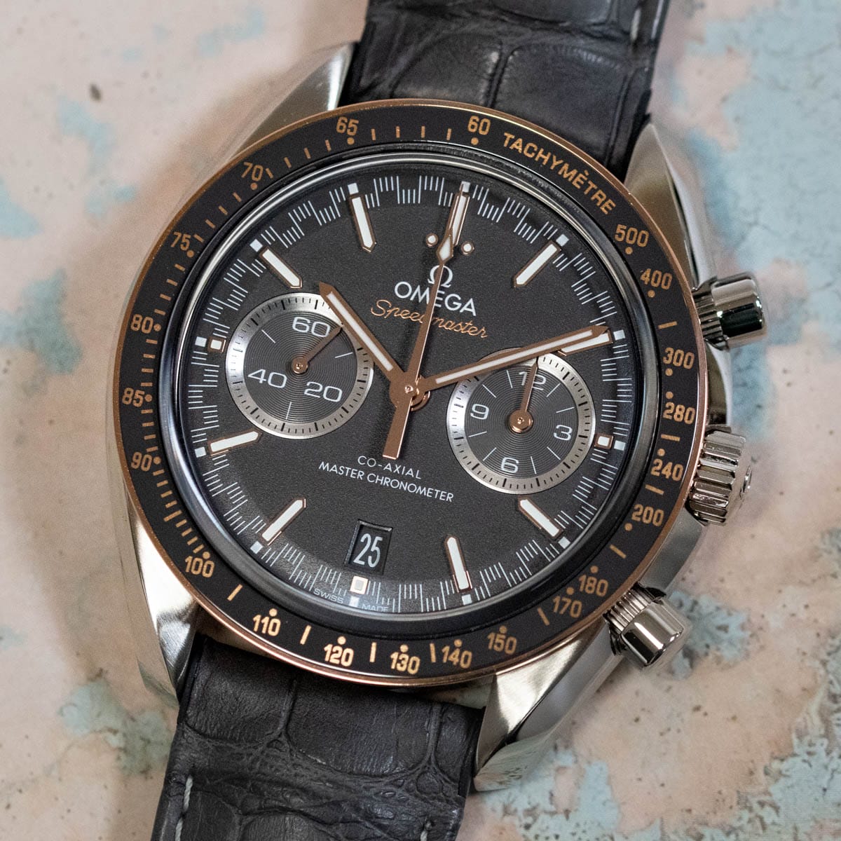 Stylied photo of  of Speedmaster Racing Chronograph