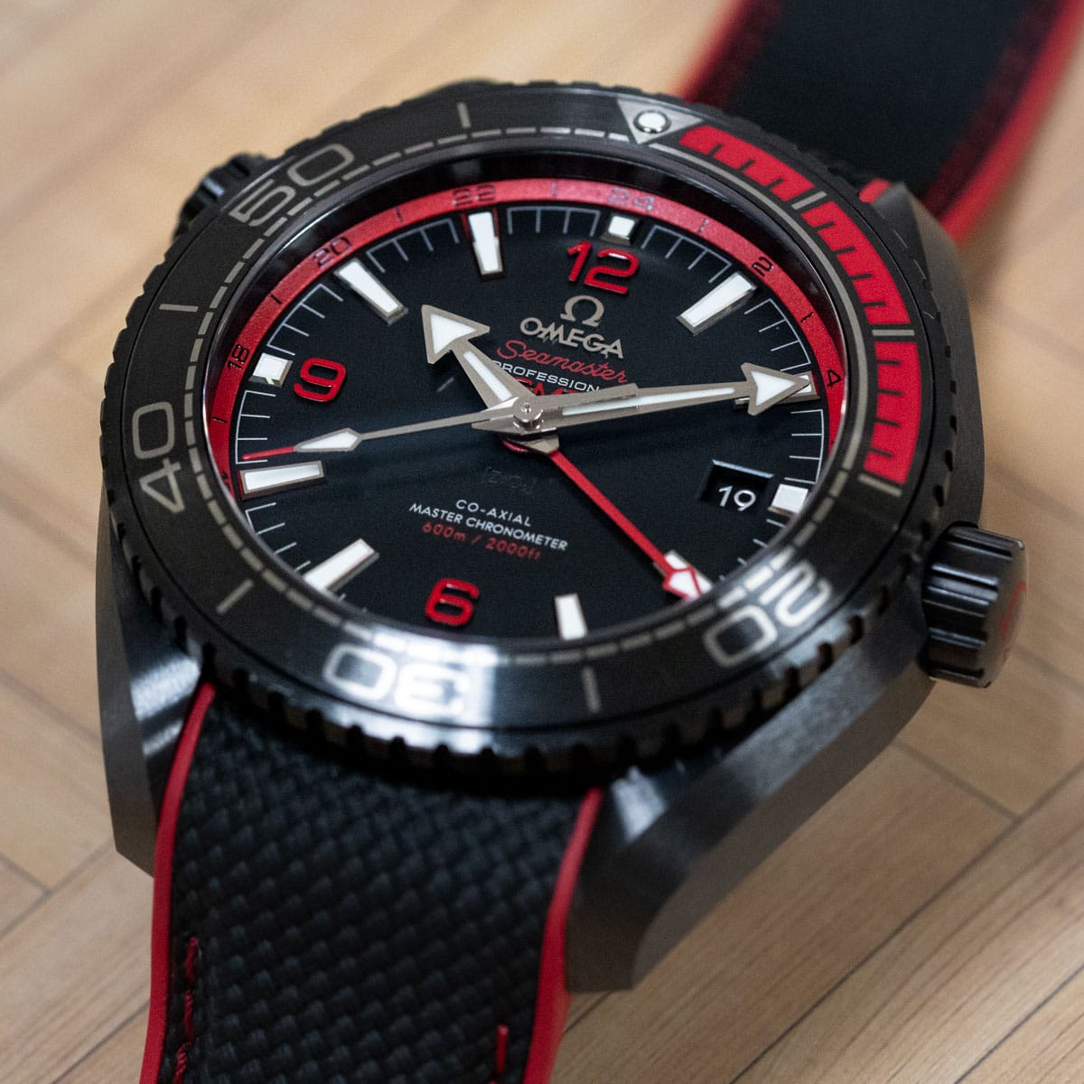 Extra Shot of Seamaster Planet Ocean GMT 'Deep Black' Red